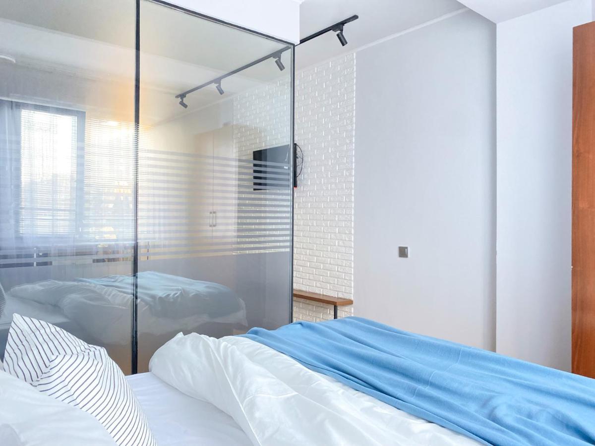Студия В Стиле Loft В Центре Города 阿拉木图 外观 照片